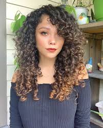 Ask your stylist to cut . 25 Best Ways To Style Curly Hair With Bangs Styledope