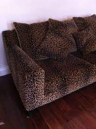 2 x 3 seater leopard print couches for