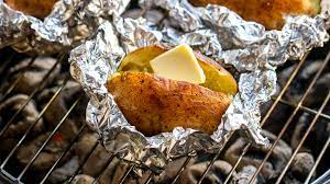 baked potatoes on the grill thecookful