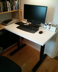 Ikea known height adjustable desk , can become a 'standing desk,' as opposed to sitting in front of it and works with just a push of a button. An Adjustable Width Bekant Desk Ikea Hackers Ikea Desk Ikea Desk