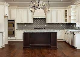 The country rustic look is all about the mixing and matching of colors and textures. Cumberland Antique White Kitchen Cabinets Country Kitchen