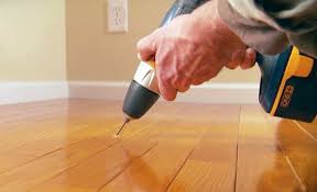 how to fix squeaky floors the