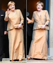 Angela merkel 's husband has accompanied his wife to cornwall for this week's g7 summit, one of the few occasions he has travelled abroad for an international conference. Angela Merkel Steps Out In Gold Suit With Husband Joachim Sauer Express Co Uk