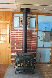 Wood Stove Wall Shield With River Rock