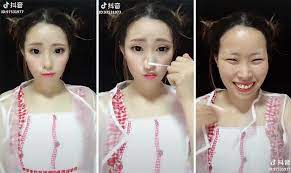 these asian women removing makeup will