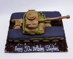 This army themed birthday consists of an army tank cake on top of a base cake with army boy, trucks, planes, rifles and grenade cupcakes. Army Tank Birthday Cake Celebration Cakes