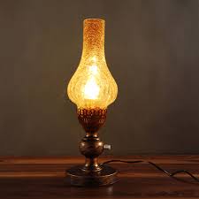 Image result for images of lighting kerosene lamp with another lamp