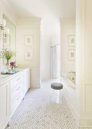 white herringbone bathroom floor tiles