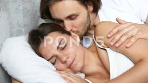 affectionate husband wakening up