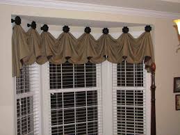 Although a single valance can span across the entire bay window, it can be difficult to match up the medallion placement at the exact point where the walls meet, unless you request a custom order. Bay Windows Are A Spectacular Sight From The Outside They Are Ornamental Decorating The Ext Curtains Living Room Bay Window Curtains Kitchen Window Valances