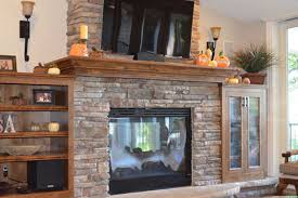 Stone Fireplace With Wood Mantle And