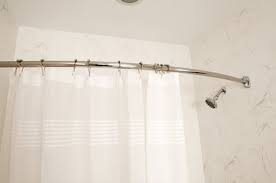 the pros and cons of curved shower rods