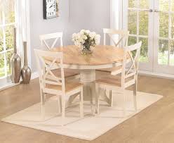 This striking designer dining set from avalona combines the kanta dining table finished with a coating of celadon epoxy powder paint, this modern metal chair complements a contemporary kitchen, dining room or office. Mark Harris Elstree Round Dining Table And 4 Chairs Oak And Cream Cfs Furniture Uk