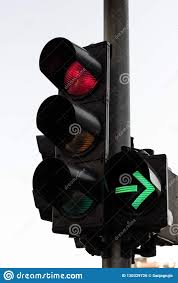 Red Color And Right Green Arrow On The Traffic Light Stock
