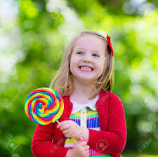 Cute Little Girl With Big Colorful Lollipop Child Eating Sweet