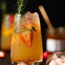 peachy ginger beer mocktail orchids
