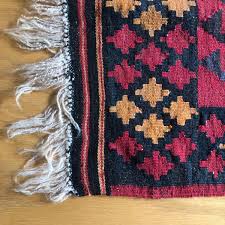 taos new mexico throw rug handmade red
