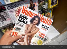 health magazine hand stack magazines