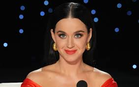katy perry gets fiery red in corset and