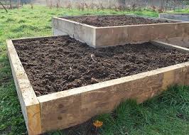 raised bed bury hill topsoil and logs