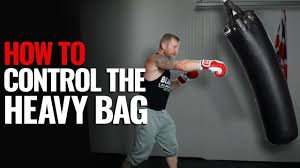 how to hit the heavy bag properly so