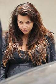 pregnant and glum kim kardashian turns