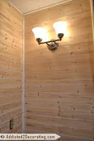 wood planked walls in a bathroom and
