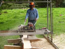 chainsaw powered swing saw mill in