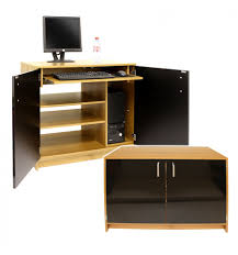 Double doors conceal your computer equipment and blend the piece into your home. Sywell Hideaway Computer Desk