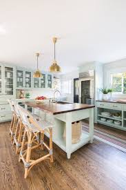 mint green kitchen cabinets emily a