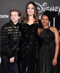 Shiloh began singing in competitions at age seven. Shiloh Jolie Pitt 13 Looks Strikingly Like Her Dad Brad At Movie Premiere With Mom Angelina Sis Zahara 14 Hollywoo Shiloh Jolie Jolie Pitt Movie Premiere
