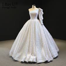 В модните колекции на известния моден дизайнер на сватбени рокли има и красива. Real Works Luxury Sparkle Seksi S Edin Rkav Svatbeni Rokli 2020 Pajeti Dubaj Beli Bulchinski Rokli