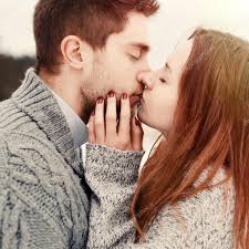 kissing in winter stock photo