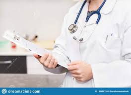 Female Doctor Holding Patient Chart Clipboard Stock Image