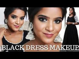black dress traditional makeup look on