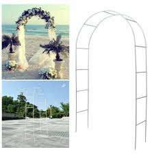 white metal arch wedding garden