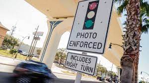 one year 56 red light cameras 10
