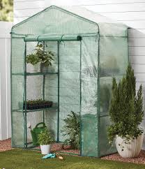expert gardener walk in greenhouse pe