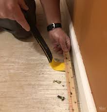 remove carpet tack strips