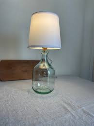 Round Tall Bottle Clear Glass Table