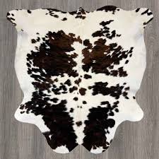 spotted brown brindle cowhide rug