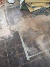 floor with old asbestos tiles not in