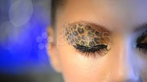 beauty with leopard makeup stock
