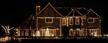 hang holiday lights from home s roof