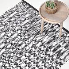 white diamond pattern recycled fibre rug