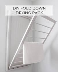 Then hang a drying rack from it. Diy Fold Down Drying Rack Crafted By The Hunts