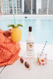 This easy to make, lovely drink offers a beautiful blend of coconut rum, pineapple, and sweet grenadine. Malibu Rum Summer Coconut Cooler Cocktail Recipe Bows Sequins