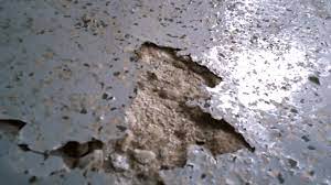 how to repair ling epoxy garage floor