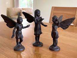 A Set Of 3 Small Cast Iron Fairy Home