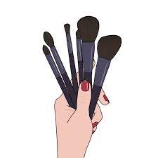 makeup brushes in hand on white